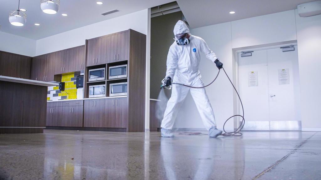 Titan Airless Sprayer Cleaning Floors